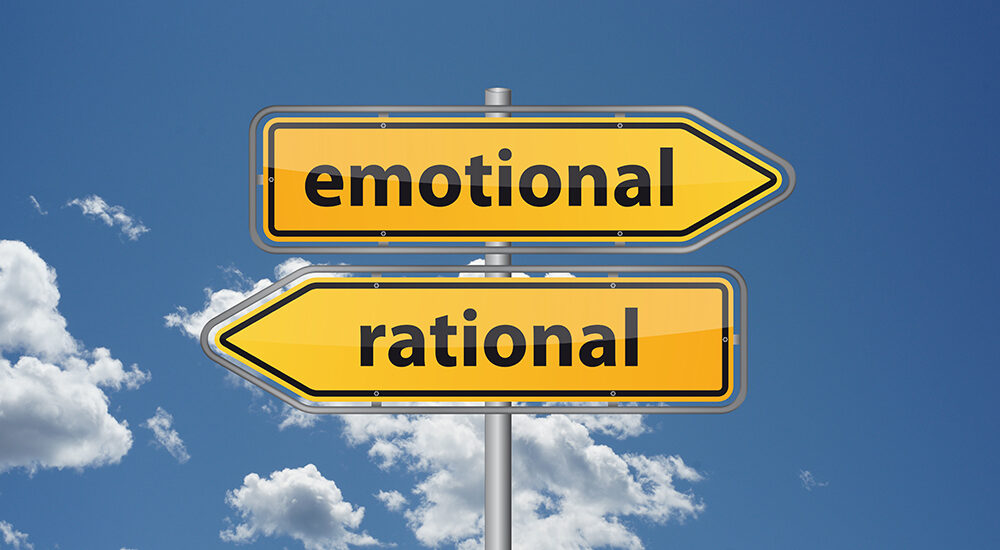 A sign highlighting and emphasizing the contrast between emotional decisionmaking and rational decisionmaking